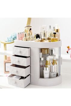 keeping your cosmetics organized and within reach is easy with this makeup organizer. With its top partition, you can store your brushes, lipsticks, eyeliners, and other tall items while its drawers are perfect for your foundations, powders, eyeshadows, and other small items. The transparent door allows for easy access to all compartments and prevents dust and debris from settling on your cosmetics. This organizer is perfect for use in the bathroom, bedroom, or dressing room. Rangement Makeup, Penyimpanan Makeup, Makeup Storage Box, Make Up Organiser, Makeup Box, Desktop Storage, Cosmetic Organizer, Makeup Organizer, Lipstick Makeup