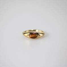 Modern Amber Oval Ring, Gold Gemstone Midi Ring For Promise, Gold Crystal Ring With Polished Finish For Formal Occasions, Classic 14k Gold Amber Jewelry, Classic Tarnish Resistant Crystal Ring Gift, Classic Crystal Ring As Gift, Formal Amber Open Ring Jewelry, Classic Tarnish-resistant Crystal Ring For Gift, Gold Signet Ring With Gemstone For Promise