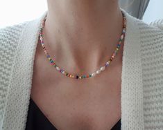 This colourful necklace is made with tiny seed beads and freshwater pearls. Perfect for a simple everyday necklace or for layering with any other necklace. The length is around 43 cm (16,9") + 5 cm extension. The closure is in stainless steel so it won't tarnish. Very light and versatile, it's perfect to add a touch of color to any outfit! Check my other seed beads accessories listings here: https://www.etsy.com/shop/StonesByAutumn?ref=seller-platform-mcnav§ion_id=47808242 Don't hesitate to ask Summer Beads, Seed Beads Necklace, Simple Necklace Everyday, Beady Eye, Beads Accessories, Beads Choker, Outfit Check, Freshwater Pearl Necklace, Everyday Necklace