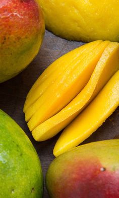 the mangoes are cut in half and ready to be eaten