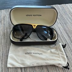 Shop breemcnaught's closet or find the perfect look from millions of stylists. Fast shipping and buyer protection. Men’s Louis Vuitton Evidence Sunglasses. Although I think they are unisex. Used. In great condition. One side of sunglasses has a white film over it (shown in the two photos second to last). Serial number shown: Z0105W Hand made in France Luxury Black Sunglasses For Travel, Luxury Aviator Sunglasses With Mirrored Lenses, Designer Aviator Sunglasses With Mirrored Lenses, Luxury Aviator Sunglasses With Uv Protection, Luxury Sunglasses With Uv Protection For Travel, Luxury Polarized Aviator Sunglasses, Luxury Aviator Sunglasses, Luxury Business Sunglasses With Tinted Lenses, Designer Black Aviator Sunglasses