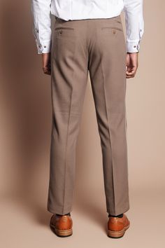 Command attention in these HM5 trousers in tan. A real attention grabber, these trousers will make you feel a million dollars no matter the occasion. The slim fitting sits perfectly in all the right places and the functional pockets to the front and reverse have enough room for all the essentials. Model wears size 32R. Features Slim fit Hook bar & button fastening Two rear welt pockets Two front slash pockets Kick tapes Belt loops Flat fronted Composition Suit: 65% Polyester, 30% Viscose, 5% Lyc Beige Tapered Trousers, Luxury Slim Fit Trousers, Beige Slim Fit Trousers, Yellow Non-stretch Trousers, Blazer Wedding, Luxury 4-way Stretch Trousers, Wedding Blazers, Navy Suit Wedding, Graduation Suits