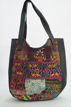 This gorgeous Indian Jaipuri Morral is perfect to style with any outfit! It is completely hand-embroidered and made on a waist loom, These beautiful bags are handmade by Indian artisans in Jaipur, Rajasthan. Material - 100% Cotton Fabric, The bag closes with a High-Quality zipper. Our bags are strictly produced by our skilled team with the natural traditional way of craftsmanship. A Perfect Shoulder Bag / Hobo Bag / Tote Bag / Hand Bag to give to an elegant look. This is the perfect gift for all Multicolor Embroidered Tote Shoulder Bag For Daily Use, Navratri Shoulder Bag With Handwork, Festival Embroidered Multicolor Hobo Bag, Festivals Multicolor Embroidery Hobo Bag, Multicolor Embroidery Hobo Bag For Festivals, Traditional Bags With Multicolor Embroidery And Handwork, Traditional Multicolor Rectangular Shoulder Bag, Multicolor Hand-stitched Bags For Everyday Use, Traditional Hand-stitched Bags For Everyday