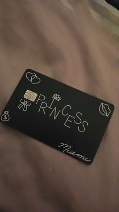 a black and white sign that says princess on it's back with handwritten words