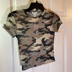 Rue 21 Women Xs Top Shirt Camo Sheer See Through Sexy Army Spandex Stretch Relax Brand New With Tags. Measurements Are In The Pictures. Only Usa Shipping And No International Shipping. Will Ship With In 3 Business Days After Payment Has Been Made. I Do Combine/Bundle Shipping. I Do Use Recycled Shipping Items To Stay Eco Friendly For Our Beautiful Earth. Please Leave Positive Feedback, And I Will Return Positive Feedback For Better Customer Satisfaction, Thanks. Summer Stretch Camouflage Tops, Fitted Camouflage Tops With Short Sleeves, Trendy Summer Camouflage Top, Trendy Camouflage Summer Top, Camouflage Fitted Short Sleeve Tops, Fitted Camouflage Short Sleeve Tops, Trendy Camouflage Tops For Summer, Spring Stretch Camouflage Top, Trendy Camouflage T-shirt For Summer