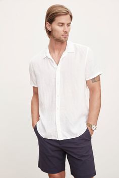 Made from woven linen fabric, this shirt exudes a laid-back vibe and can easily be dressed up. With a relaxed fit and traditional features, this short sleeve shirt is perfect for warm weather seasons. You can wear it on its own or layer it over you favorite tee. Classic Short Sleeve Shirt With Camp Collar For Beach, Classic Beach Shirt With Camp Collar, Classic Short Sleeve Camp Collar Shirt For Beach, Classic Collared Short Sleeve Shirt For Beach, Classic Camp Collar Short Sleeve Shirt For Beach, Classic Collared Shirt For Vacation, Classic Camp Shirt With Spread Collar For Vacation, Classic Spread Collar Camp Shirt For Vacation, Classic Camp Shirt For Summer Beach