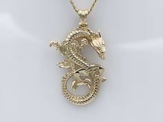 SJCo. Jewellers Manufacturers of fine Jewellery Item Description SOLID 9CT YELLOW GOLD LARGE DRAGON PENDANT RRP - $859 Height: 40mm (including bale) Width: 24mm Thickness: 6.5mm Weight: 6.9 grams All items are guaranteed to be 100% solid 9ct gold. We are a Sydney based workshop specialising in handmade chains, bangles and rings as well as vintage jewellery and watches. Our goal is to provide our complete customer satisfaction. Every week a new lot of items are listed so there is always something Large Dragon, Fantasy Necklace, Gold Dragon, Dragon Jewelry, Dragon Pendant, Round Pendant, Fine Jewellery, Quality Diamonds, Vintage Jewellery