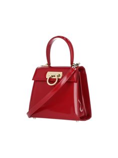 Ferragamo Iconic S handbag in red leather with top handle, removable shoulder strap, gold-plated metal iconic hook closure, and two separate interior compartments. Composition: 100% Leather Red Shoulder Bag With Metal Hardware For Evening, Evening Red Shoulder Bag With Metal Hardware, Red Evening Shoulder Bag With Metal Hardware, Formal Red Shoulder Bag With Metal Hardware, Red Luxury Bags With Metal Hardware, Red Satchel With Gold-tone Hardware Modern Style, Luxury Red Bag With Metal Hardware, Luxury Red Bags With Metal Hardware, Modern Red Satchel With Gold-tone Hardware