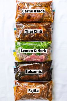 four bags of food are labeled in different colors and sizes, with the names of each bag