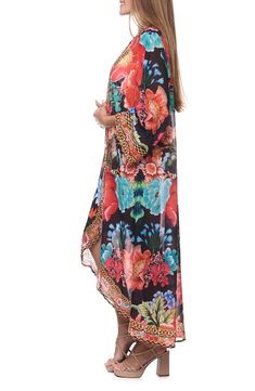 Cover up your beach-ready look with this lightweight duster covered in a floral pattern. Open front Long sleeves 100% polyester Hand wash, dry flat Imported Multicolor Tropical Print Kimono For Summer, Floral Print Open Front Cover-up For Vacation, Flowy Floral Print Kimono For The Beach, Casual Floral Print Kimono For Beach, Multicolor Print Kimono For Vacation, Open Front Floral Print Cover-up For Vacation, Flowy Floral Print Kimono For Beach Season, Multicolor Printed Kimono For Vacation, Casual Multicolor Print Kimono For Beach