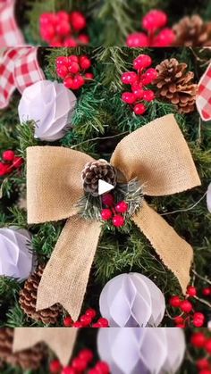 a christmas tree decorated with pine cones and burlocks, red berries and white balls