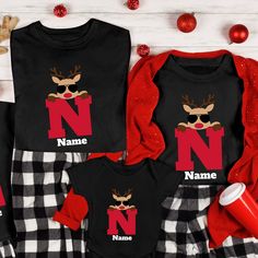 Introducing our Custom Christmas Monogram With Name Cool Pajama T-Shirt – the epitome of festive style and personalized charm for your family celebrations! Elevate your holiday spirit with these unique shirts, designed to bring a cool and personalized touch to your Christmas attire.

Featuring a stylish monogram with custom names, these shirts add a modern and trendy flair to your Christmas wardrobe. The cool reindeer design infuses a touch of holiday whimsy, making these shirts a standout choic Holiday Casual T-shirt With Custom Print, Personalized Christmas Pajamas Kids, Family Matching Holiday T-shirts With Letter Print, Holiday Family Matching T-shirt With Letter Print, Christmas Monogram Shirt, Personalized Christmas Pajamas, Personalized Christmas Shirts, Family Reunion Gifts, Reunion Gift