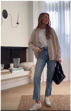 20+ Autumn Outfits You Need to Try This Year 34 Check more at https://beautyfashionideas.com/uncategorized/20-autumn-outfits-you-need-to-try-this-year-34/ Sweater Tank And Cardigan Set Outfit, Office Cozy Outfit, Black Neutral Outfit, Modern Spring Outfits, Casual Classy Outfits With Sneakers, Minimalist Outfits Women Casual, European Comfy Outfits, Cute Basic Jean Outfits, Easy College Outfits Casual