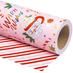 a roll of pink christmas wrapping paper with santa's sleigh on it