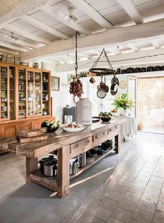 the kitchen is clean and ready to be used for cooking or baking, with an island in the middle