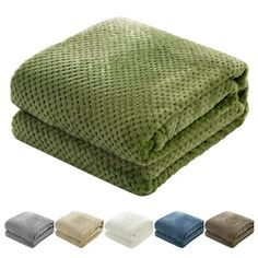 towels with different colors and sizes are shown in the image, including one green towel