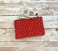 This cute coin purse pouch is handmade by us using a red polka dot heavy cotton fabric, interior is lined with 100% cotton. Pattern placement will vary. Use as a coin purse, wallet, organizer pouch, or whatever you'd like! This is made to order. Measurements: 5 inches wide. 3 inches high. Thank you for your support! Care: Spot clean with damp rag, air dry. Wallet Organizer, Cute Coin Purse, Coin Purse Wallet, Pouch Organizer, Red Polka Dot, Zip Pouch, Purse Pouch, Small Wallet, Coin Purses