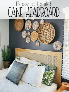 an easy to build cane headboard made out of wicker baskets on the wall