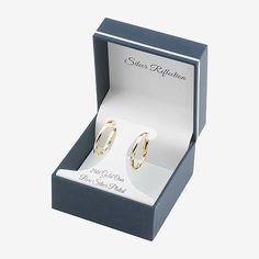 Sparkle and shine is what these Silver Reflections 24K gold over brass hoop earrings will add to any wardrobe choice. These earrings are crafted in 24K gold over brass, 20mm in length and have a lever-back closure. Wipe earrings clean with a soft cloth.Included: 1 Pair of EarringsFeatures: Nickel Free, In A Gift BoxEarring Back: Lever BackMetal Color: Gold ToneEarring Length: 20mmEarring Width: 27mmCare: Wipe CleanEarrings Style: Hoop EarringsMetal: 24k Gold Over BrassCountry of Origin: Imported Classic Clip-on Hoop Earrings As Gift, Modern Clip-on Hoop Earrings As Gift, Small Hoop Clip-on Earrings For Gift, Small Hoop Clip-on Huggie Earrings As Gift, Classic Clip-on Huggie Earrings As Gift, Modern Shiny Hoop Earrings Gift, Modern Hoop Earrings With Shiny Finish Gift, Gold Clip-on Hoop Earrings For Gift, Gold Tarnish Resistant Hoop Earrings As Gift