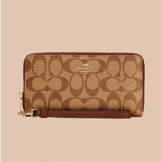 Nwt Coach Large Wallet In Brown Coach Rectangular Travel Wallet, Coach Rectangular Wallet For Travel, Coach Travel Wallets Rectangular, Coach Travel Wallet, Rectangular, Elegant Coach Wallet With Removable Pouch, Elegant Everyday Coach Wallets, Coach Designer Wallets For Everyday Use, Designer Coach Wallets For Everyday Use, Chic Coach Wallets For Travel