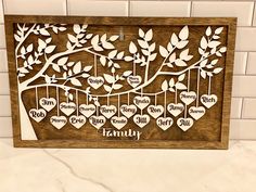 a family tree with hearts hanging from it