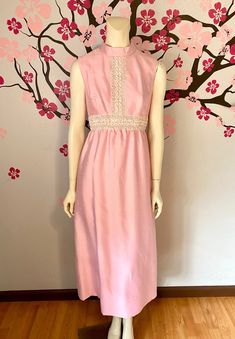 A beautiful 60's one of kind pink gown. Zips up the back. Fully lined. Looks to be hand sewn by someone back in the 60's. Its gorgeous! Classic style. Condition: Excellent-pre-owned, please see pictures. Lay flat measurements Shoulder to shoulder: 14 inches. Armpit to armpit: 17 inches. Waist: 14.5 inches. Hips: 22 inches. Length: 52 inches. Mahalo, Christina Pink Sleeveless Dress For Vintage Fashion, Pink Lined Dress For Wedding, Pink Sleeveless Vintage Dress For Spring, Vintage Pink Maxi Dress For Wedding, Vintage Pink Maxi Dress For Evening, Feminine Pink Vintage Dress For Evening, Pink Feminine Vintage Dress For Evening, Pink Vintage Maxi Dress For Wedding, Pink Lined Vintage Dress