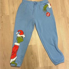 The Grinch Pink(Mas) Line Blue Sweatpants For Women, With Pockets. Great For Lounging Around. Relaxed Fit, Very Comfortable. Women's Medium. Grinch Pants, Black Velvet Outfit, Camo Jogger Pants, Sweatpants For Women, Lululemon Joggers, Blue Sweatpants, Velvet Clothes, Drawstring Jogger, Jersey Pants