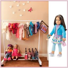 an advertisement for the american girl doll store with two dolls and clothes on display in front of it