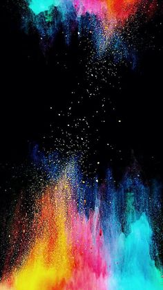 colorful powder sprinkles on black background