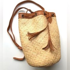 Brand New Bag! Super Cute With Any Outfit! Inner Brand Name Tag Marked To Prevent Store Returns Natural Travel Bags With Tassels, Natural Color Travel Bags With Tassels, Casual Tassel Bucket Bag, Casual Natural Color Backpack Shoulder Bag, Casual Natural Backpack Shoulder Bag, Casual Natural Shoulder Bag Backpack, Casual Natural Shoulder Backpack, Bohemian Backpack In Natural Color For Everyday Use, Bohemian Style Natural Color Backpack For Everyday Use