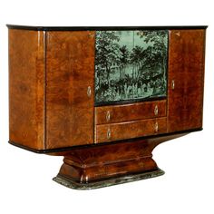 an art deco cabinet with pictures on the doors