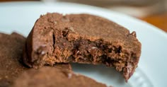 two pieces of chocolate brownie on a plate