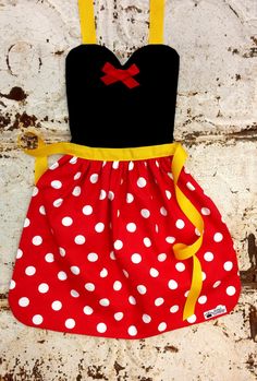 a red and white polka dot dress hanging on a brick wall with the words pin sewing pattern