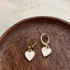 White Heart Dangle Earrings Trendy White Heart-shaped Earrings, White Heart Charm Earrings, Trendy White Heart Earrings Gift, Trendy White Heart Earrings For Gift, White Heart Pendant Earrings For Valentine's Day, White Heart Charm Pendant Earrings, White Earrings With Heart Charm As Gift, White Heart Charm Earrings For Valentine's Day, Minimalist White Heart Earrings For Everyday