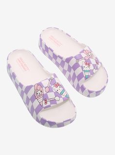 Need a new pair of slides for warmer weather? This pair of chunky white-and-lavender checkered slides show Hello Kitty and My Melody as ice cream cones.Listed in women's sizes.S: 5-6M: 7-8L: 9-10XL: 11-12PolyurethaneImported Cute Spring Slides, Casual Purple Slides For Spring, My Melody Ice Cream, Hello Kitty And My Melody, Hot Topic Shoes, Exploding Kittens, Emily The Strange, Bee And Puppycat, Blue Beetle