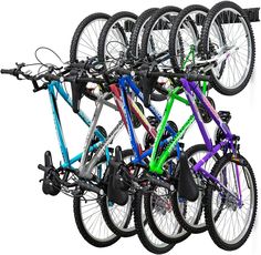 several bikes are stacked on top of each other in the same space, and one is upside down