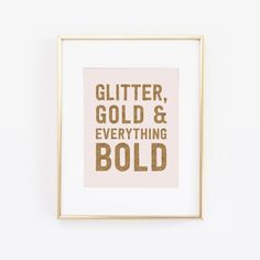 a framed print with the words glitter, gold and everything bold