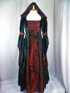 This listing is for a custom made dress,it will be made to your measurements. Please send me your bust,waist and hip measurement,and please measure from the top of your shoulder to the floor with shoes on. Could you also send your bicep measurement thank you. It will be made with beautiful jet black crushed velvet and stunning burgundy and black flocked taffeta. It will have corset style front and back with lacing so you can adjust the dress to fit your body shape. Combined shipping on multiple items. If you purchase express shipping by courier please send me your phone number thank you. Fitted Gothic Ball Gown, Vintage Fitted Gown For Halloween, Vintage Fitted Halloween Gown, Fitted Gothic Gown For Fancy Dress, Gothic Fitted Gown For Fancy Dress, Halloween Costume Dress With Corset Back, Fitted Gothic Gown For Costume Party, Fitted Gothic Gown For Costume, Gothic Fitted Gown For Costume