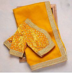 Georgette saree, matching velvet blouse with hand embroidery in custom colors. Blouse will be custom tailored in the design of your choice Saree length 5.5 meters Blouse custom stitched. Measurements sheet will be provided. Velvet Blouse For Saree, Yellow Georgette Saree, Velvet Blouse Design, 50 Blouse Designs, Velvet Saree, Raw Silk Blouse, Match Velvet, Zardosi Embroidery, Embroidery Blouses