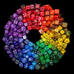 many different colored dices arranged in a circle