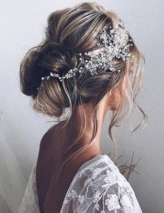 a woman wearing a bridal hair comb