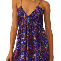 The Billowy Silhouette Of This Sleeveless Free People Top Is Enhanced With Tonal Florals And A Chic Halter Neckline. Color Is Royal Combo. Tie Closure Halter Neck Sleeveless Unlined 26" L Material & Care Viscose Machine Washable V-neck Floral Print Tank Top For Beach, Floral Print V-neck Tank Top For Beach, Blue Floral Print Tank Top For Summer, Purple Floral Print Summer Tank Top, Bohemian Blue Tank Top For Beach, Summer Purple Floral Print Tank Top, Blue Bohemian Cami Tank Top, Blue Spaghetti Strap Tank Top For Beach Season, Blue Beachwear Tank Top For Summer