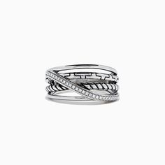 a stack of silver rings with white diamonds on each one and an intertwined band