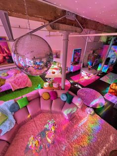 a room filled with lots of furniture and disco balls