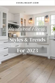 a kitchen with white cabinets and wood floors that says hardwood floors styles & trends for 2013