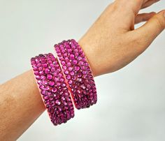 Bangle bracelets with 5 rows of stones, 24 colors of rhinestones and 15 colors of the backing are available.  Sizes (inner diameter) - THE DEFAULT SIZE IS M. Please, add the comment if you need another size. S: 2.375 Inches (6 cm); M: 2.5 Inches (6.5 cm); L: 2.75 Inches (7 cm). How to choose your size: 1) Measure the inner diameter of a bangle bracelet that fits you well. 2) You can also cut a piece of paper 1 inch wide (2.5 cm), 10 inches long (25 cm) and mark the dimensions S, M, L on it (like Pink Crystal Bracelet With Rhinestones, Traditional Pink Bangle For Party, Rhinestone Bangle For Party, Jeweled Bracelets For Party And Festivals, Festival Party Beaded Bangle, Adjustable Sparkling Bangle For Party, Pink Crystal Bracelet With Sparkling Stones For Party, Adjustable Crystal Bangle For Party, Pink Crystal Bracelets For Party