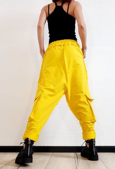 "Extravagant Harem Pants, Cotton Pants, Harem Trousers, Loose Cotton Pants, Women Pants, Hip Hop Pants ❤️ Extravagant designs and high quality fabrics! ❤️ Materials & Care Cotton, Polyester Hand wash at low temperatures. Do not machine dry. Do not iron. Do not dry clean! ❤️ Sizing We can make your piece from XS to 5XL! Everything in the shop can be also made according to your measures free of charge! ❤️ Shipping ✈ Ready to ship The time I need to prepare an order for shipping varies. For det Yellow Pants With Side Pockets, Relaxed Fit Yellow Pants With Pockets, Yellow Relaxed Fit Pants With Pockets, Yellow Wide Leg Pants With Side Pockets, Yellow Straight Pants With Pockets, Yellow Ankle-length Pants With Pockets, Ankle-length Yellow Pants With Pockets, Yellow Relaxed Fit Ankle-length Pants, Yellow Harem Pants With Pockets