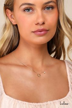 Include the Lulus Sweet Addition Gold Bow Rhinestone Chain Necklace in any of your favorite 'fits for a too-chic finish! This darling lil' necklace is composed of shiny gold-toned metal that shapes an ultra-slender chain with a darling bow charm that sits at the center. A petite rhinestone detail at the side lends a hint of sparkle to this cute design. Lobster Clasp Closure. Chain Measures 15. 25" Long With A 2" Extender Chain. 90% Brass, 10% Cubic Zirconia. Imported. Lulus | Sweet Addition Gold Dainty Gold Rhinestone Necklace For Party, Dainty Party Necklace With Diamond Accents, Dainty Necklace With Diamond Accents For Party, Dainty Diamond Accent Necklace For Parties, Feminine Gold Cubic Zirconia Jewelry, Party Gold Diamond Necklace With Delicate Chain, Rose Gold Charm Necklace With Delicate Chain For Party, Party Rose Gold Charm Necklace With Delicate Chain, Delicate Rose Gold Charm Necklace For Parties