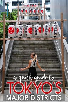 a woman standing on top of a set of stairs with the words tokyo's major district