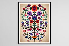 a colorful floral print hanging on the wall